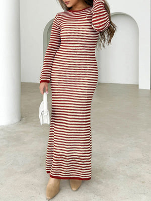 Striped maxi sweater dress in red and cream with long sleeves and a back tie detail.