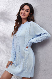 Light blue cable knit sweater dress with crew neck and long sleeves.