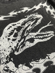 Black distressed graphic tee with a white dinosaur motif and tribal flames.