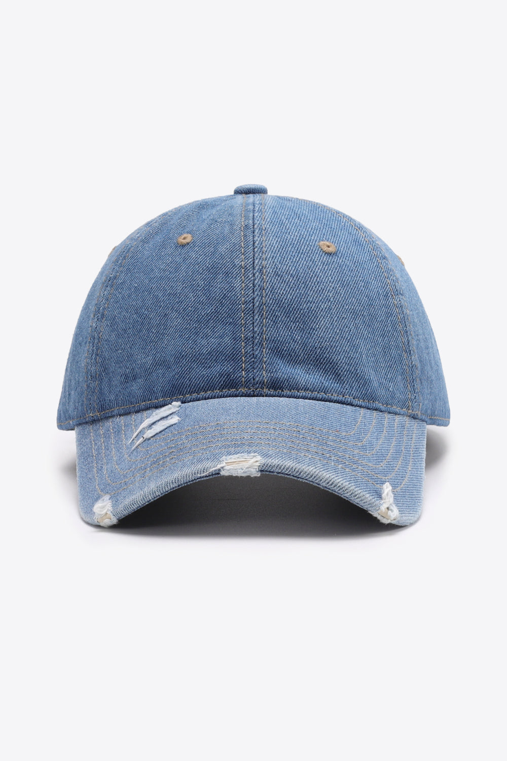 Distressed denim baseball cap in light blue with frayed details.