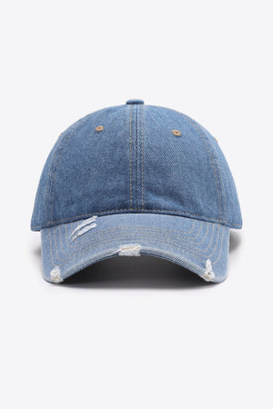 Distressed denim baseball cap in light blue with frayed details.