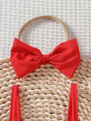 Red baby top with bow detail and ruffle straps, part of a set.