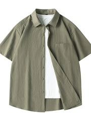 Men's relaxed fit short sleeve shirt in Military Green, cotton, with chest pocket and button-up front.