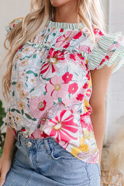 Floral ruffle sleeve blouse with smocked neckline and green stripe accents.