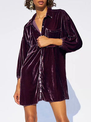 Velvet oversized shirt in deep purple with button front and chest pockets.