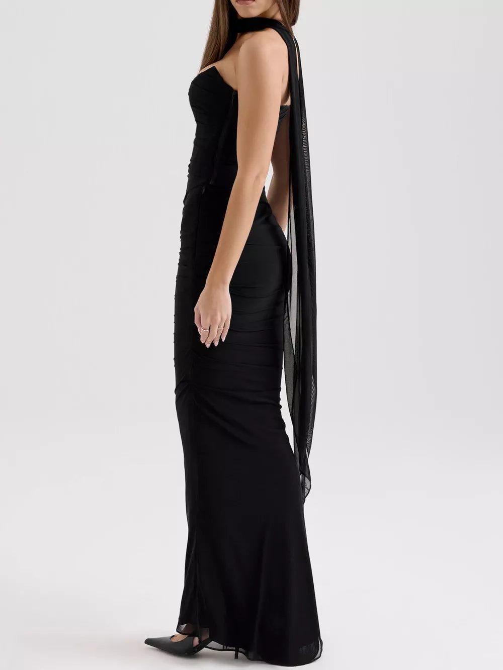 Black sweetheart neckline ruched maxi dress with flowing sheer sleeves.