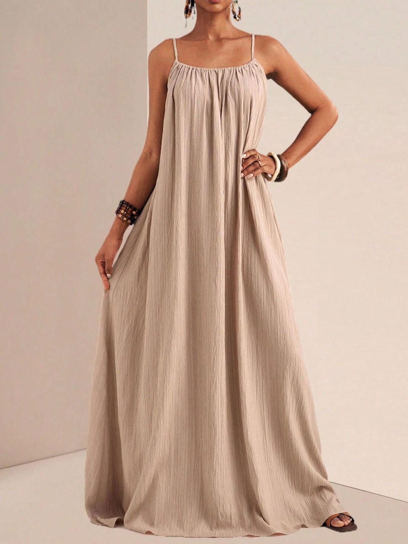 Khaki maxi swim dress with spaghetti straps and gathered neckline.