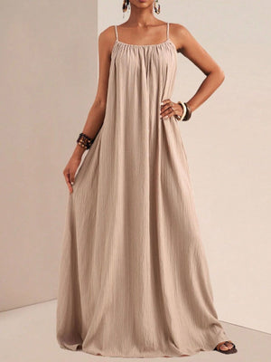 Khaki maxi swim dress with spaghetti straps and gathered neckline.