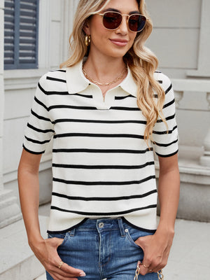 Nautical stripe knit polo top in black and white with short sleeves and a collar.