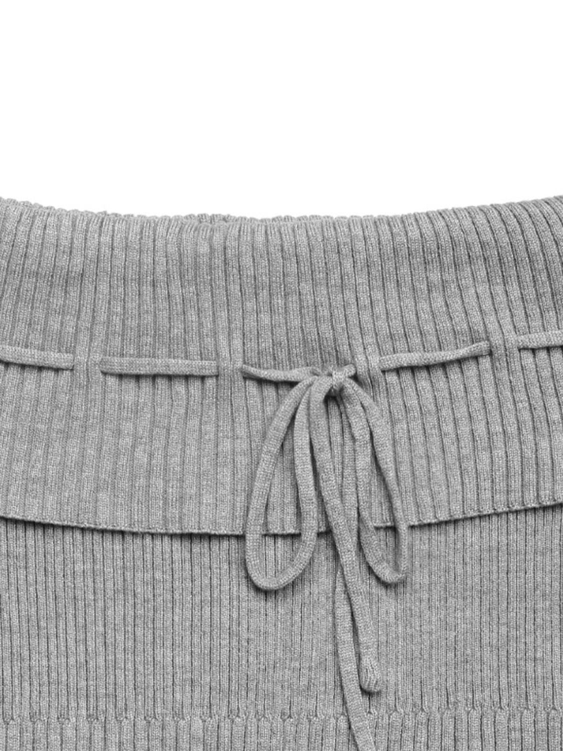 Gray ribbed knit off-shoulder blouse with a tie bow detail
