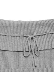 Gray ribbed knit off-shoulder blouse with a tie bow detail