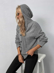 Gray button-front hooded knit cardigan with ribbed cuffs and hem.
