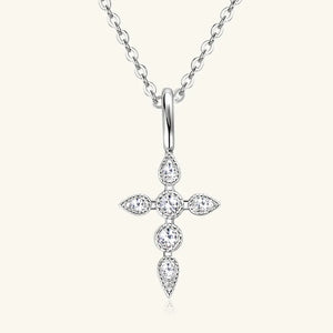 Silver diamond-set cross pendant necklace with a delicate chain.