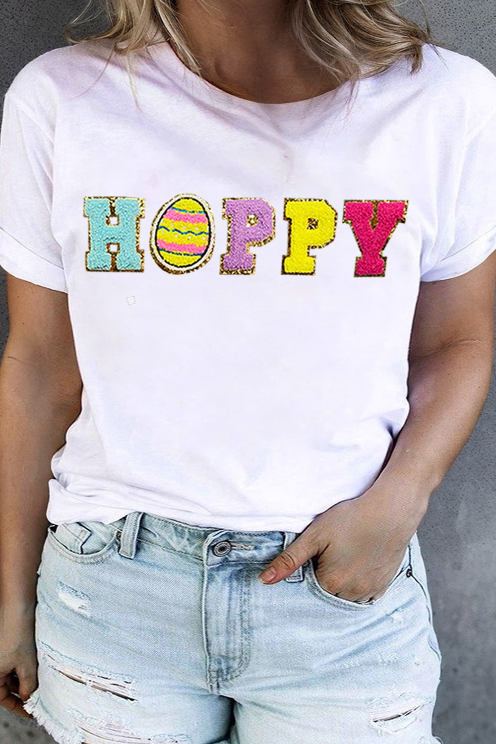 White graphic tee with sequin "Hoppy" Easter egg design