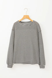 Black and white striped long sleeve tee with crew neck.