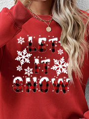 Red crewneck sweatshirt with "Let It Snow" graphic and buffalo plaid lettering.