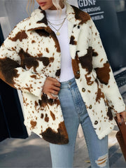 Cow print plush shacket in ivory and brown with button front and collar.