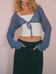 Dusty blue crochet tie-front bolero shrug with long sleeves and open knit detail.