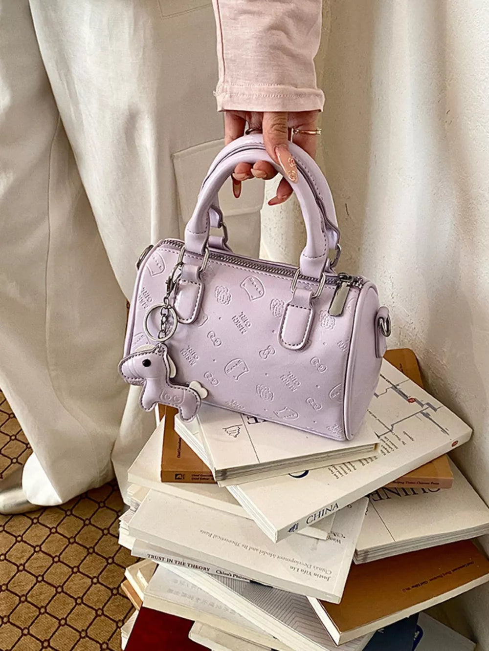 Top Handle Crossbody Bag in Pink Purple, close-up detail