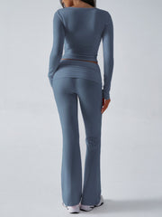 Dusty Blue long sleeve cross-front top and flare lounge pants set.