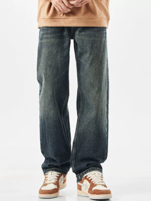 Relaxed fit vintage wide-leg jeans in blue denim with a faded wash.