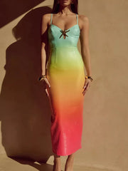 Sequined cami dress with sweetheart neckline, cut-out detail, and gradient color from mint to orange to pink.