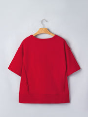 Red cotton blend drop shoulder tee with short sleeves and a banded hem.