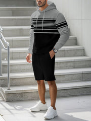 Men's grey and black textured stripe hoodie with drawstring and matching black shorts.