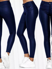 Blue high-waisted faux-leather skinny pants with a smooth finish.