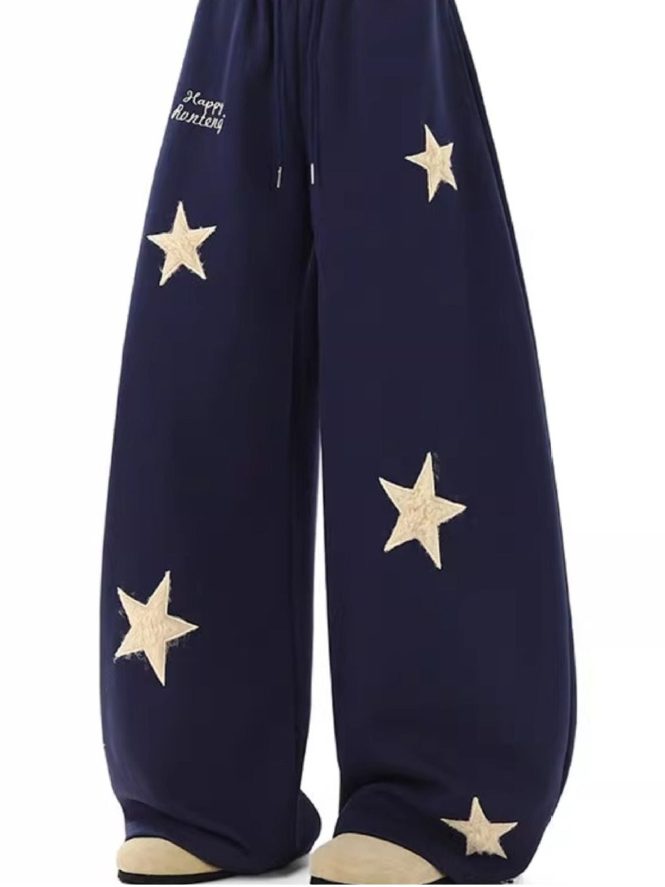 Navy wide leg sweatpants with drawstring and embroidered stars