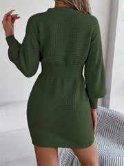 Army green cable knit dress with hourglass fit and balloon sleeves.