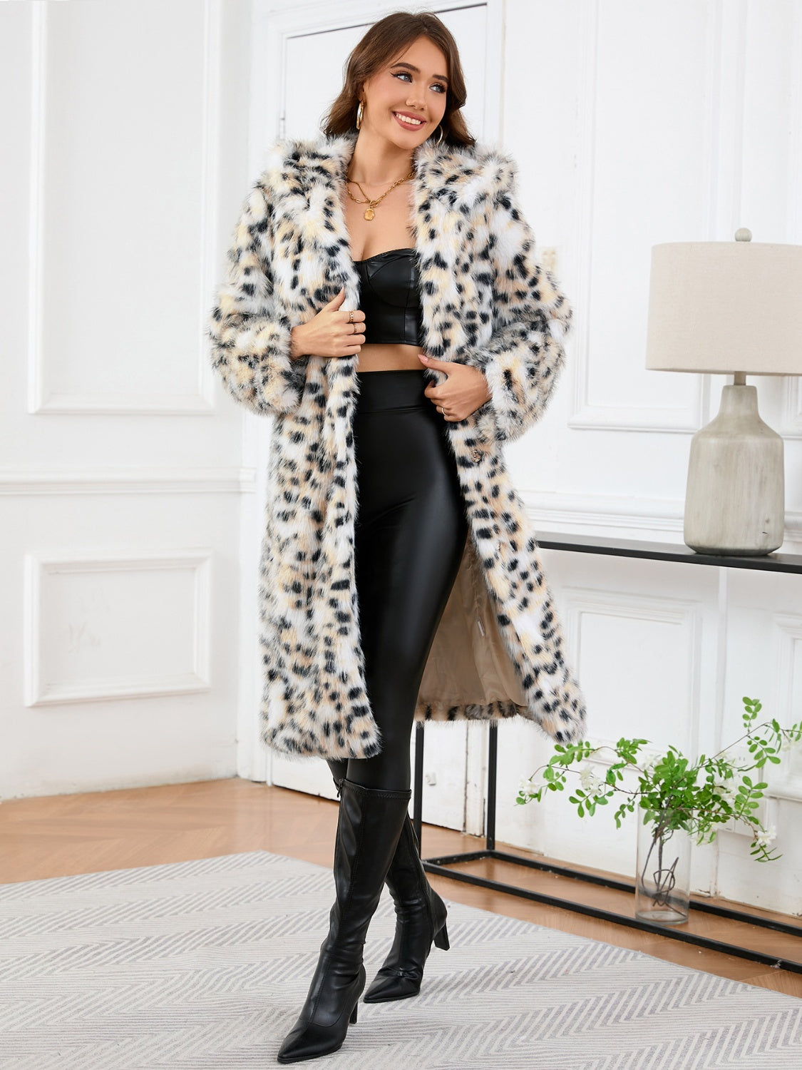 Leopard print faux fur maxi coat with hood, open front, and long sleeves.