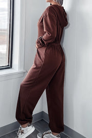 Brown hooded lounge jumpsuit with wide leg and elastic waist, shown from side.