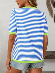 Light blue and white striped knit tee with contrast green trim and short sleeves.