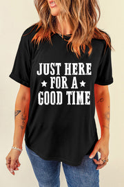 Black graphic tee with distressed white text that reads "JUST HERE FOR A GOOD TIME