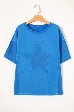 Blue mineral wash cotton tee with star patchwork and mesh side panels.