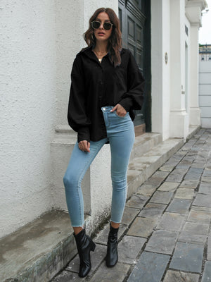 Black balloon sleeve poplin button-down shirt with a collared neckline.
