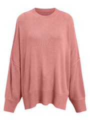 Oversized ribbed knit sweater in dusty pink with drop shoulders and crew neck.
