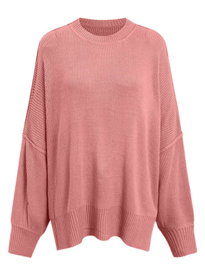 Oversized ribbed knit sweater in dusty pink with drop shoulders and crew neck.