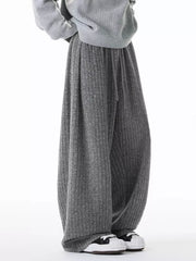 Relaxed ribbed knit sweatpants in dark gray with drawstring waist and wide leg