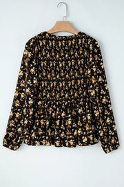Black floral smocked waist long-sleeve blouse with peplum hem