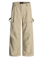 Khaki wide-leg cargo trousers with large front pockets and strap details.