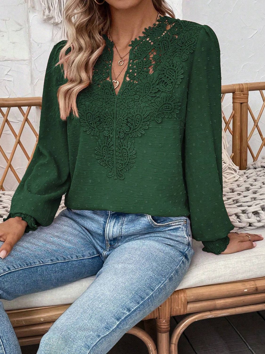 Dark green blouse with lace yoke and puff sleeves, textured fabric