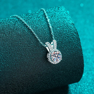 Silver halo diamond pendant necklace with rabbit ear detail in 925 sterling silver.