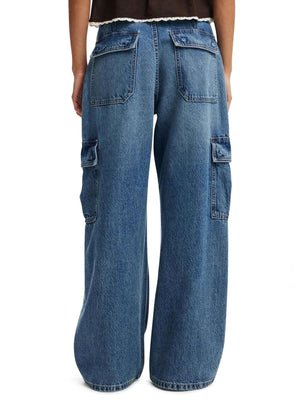 Wide leg cargo denim jeans in dark blue with multiple buttoned pockets.