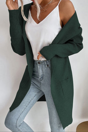 Drape-front hooded ribbed knit cardigan in Black Forest with pockets and long sleeves.