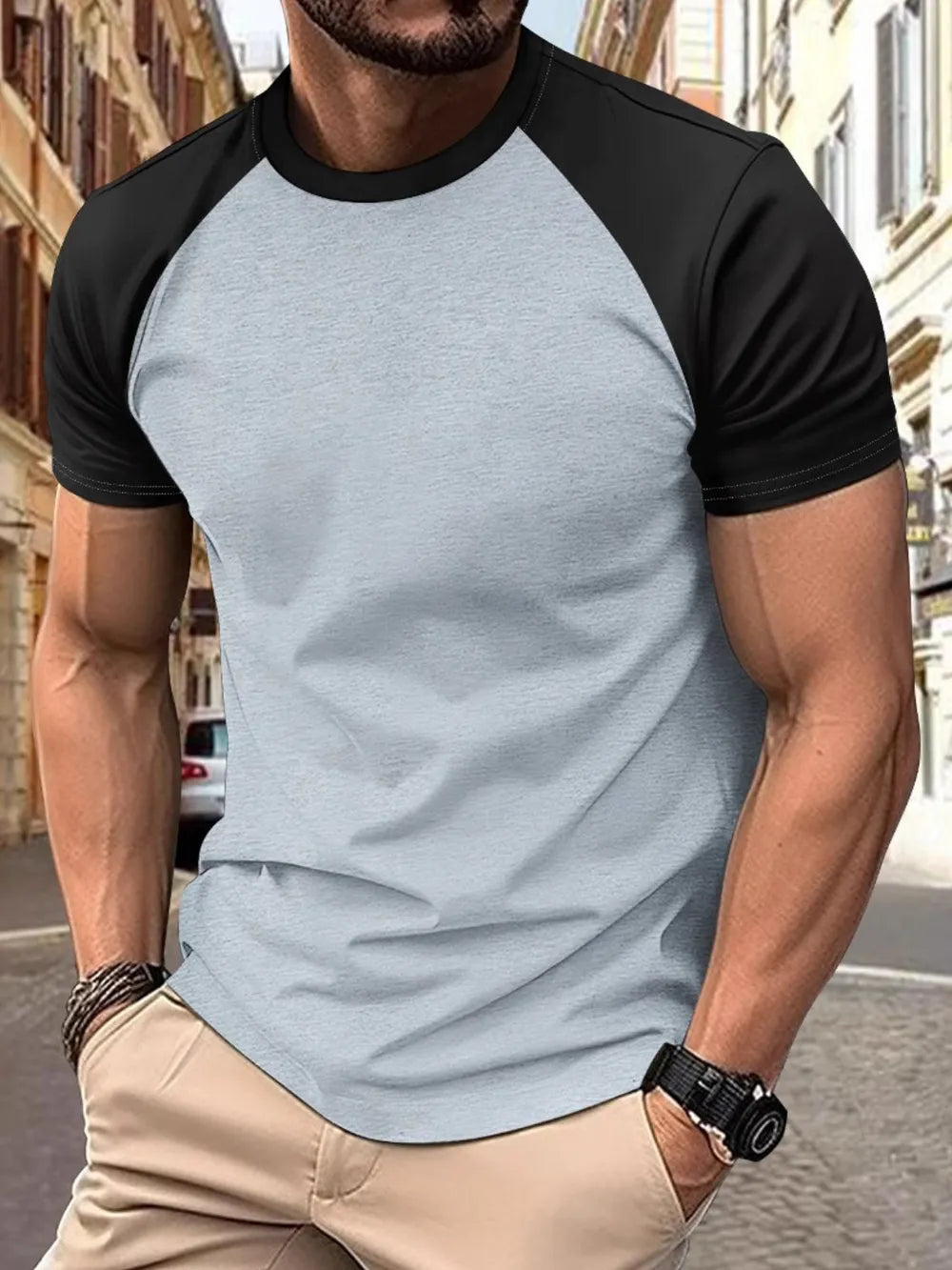 Colorblock raglan tee in light gray with black sleeves, crew neck, short sleeves.