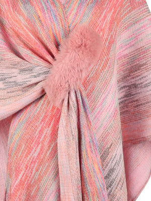 Knit wrap coat in multicolor stripes with a pink faux fur pom-pom detail.