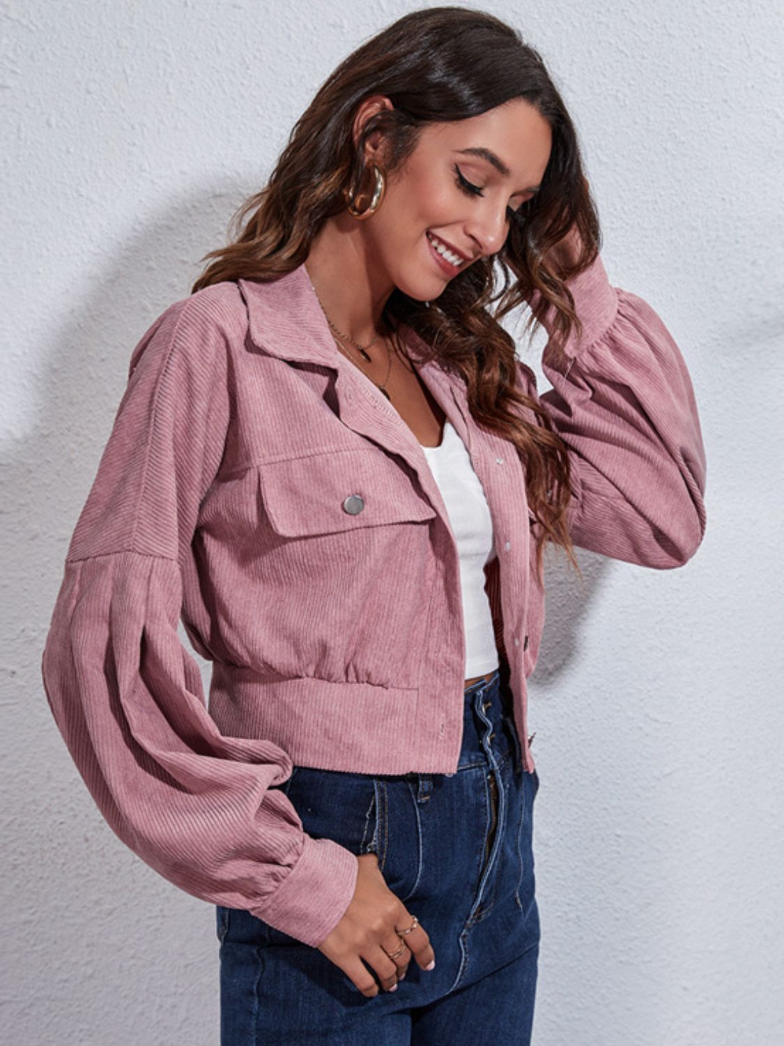 Dusty Pink corduroy cropped jacket with balloon sleeves and button front.
