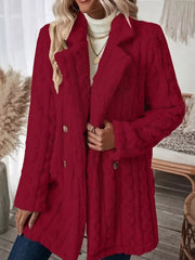 Red faux shearling double-breasted overcoat with cable knit texture and button closure.